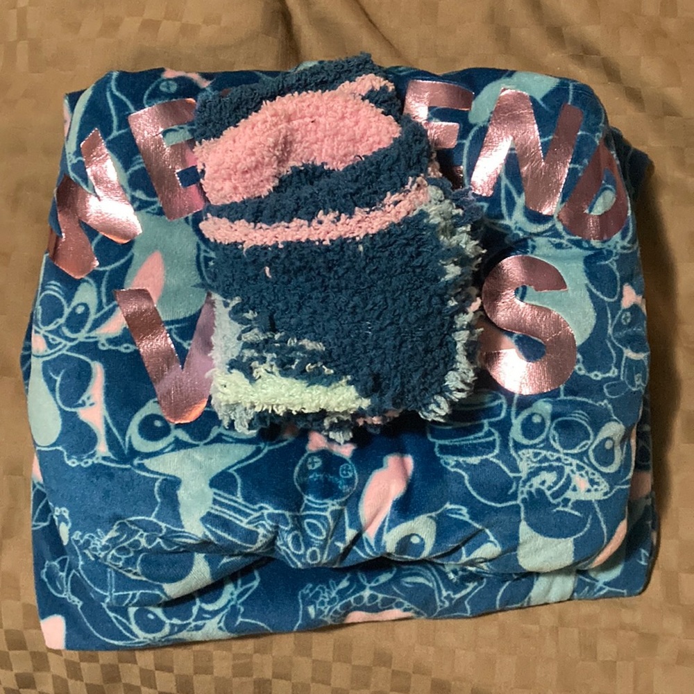 Stich pajama set. Pants, shirt and socks. Only worn once